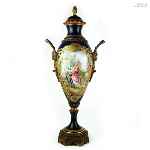 An ormolu mounted blue, gilt and polychrome porcelain