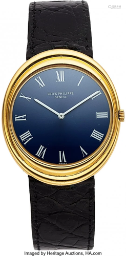 54076: Patek Philippe, Rare Large Oval Yellow Gold Auto