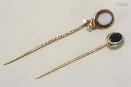 Two Gold and Coloured Stone Stick Pins,