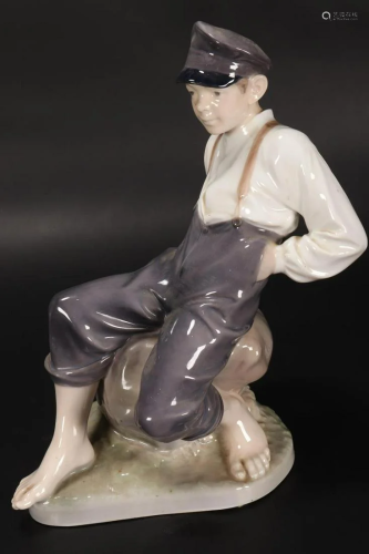 Royal Copenhagen Porcelain Figure of a Boy,