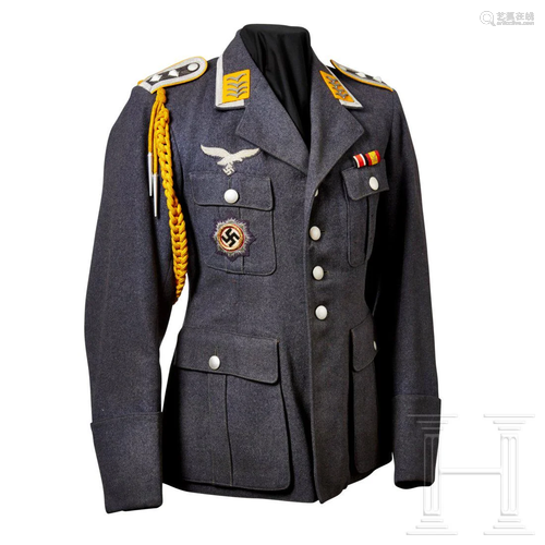 A tunic for Oberfeldwebel and German Cross in Gold