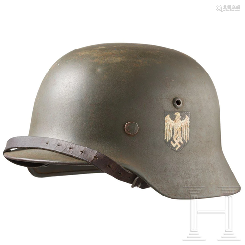 A steel helmet M35 with double decal of the German army