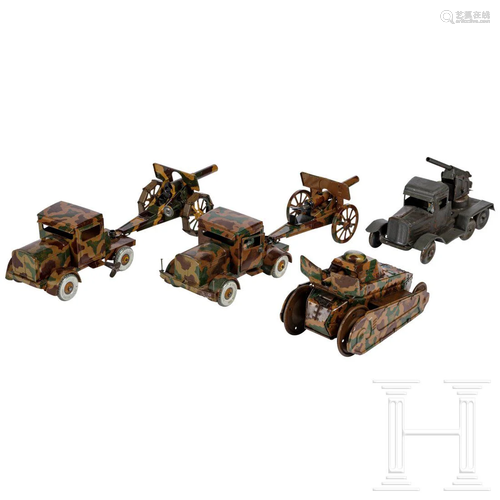 Four TippCo and Goeso military toy vehicles with Flak