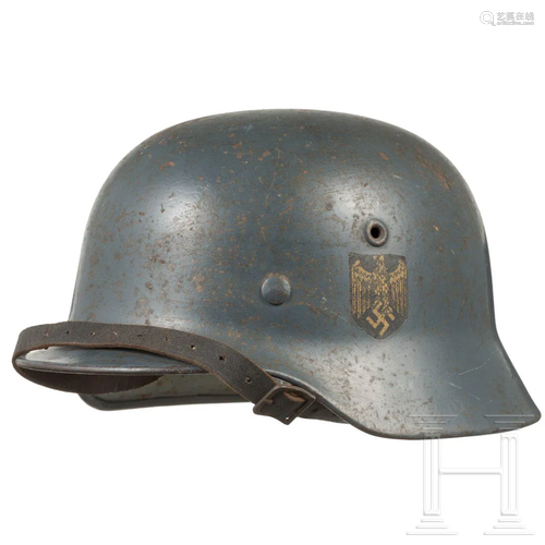 A Kriegsmarine steel helmet M 40 with a single decal