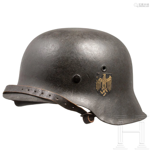 A Kriegsmarine steel helmet M 42 with a single decal