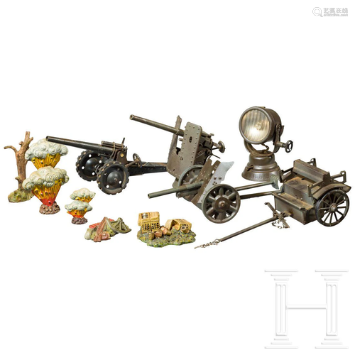 A group of Hausser-Elastolin military toys with a grey