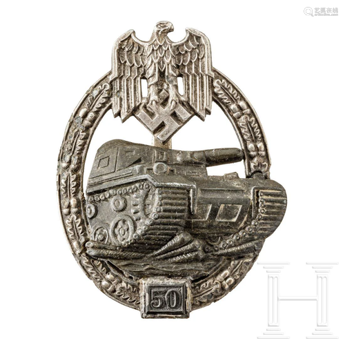 A tank assault badge in silver 3rd grade for 50 combat