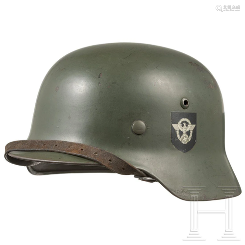 A police steel helmet M 35 with double decals