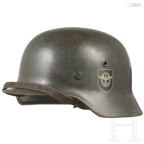 A police steel helmet M 40 with double decals