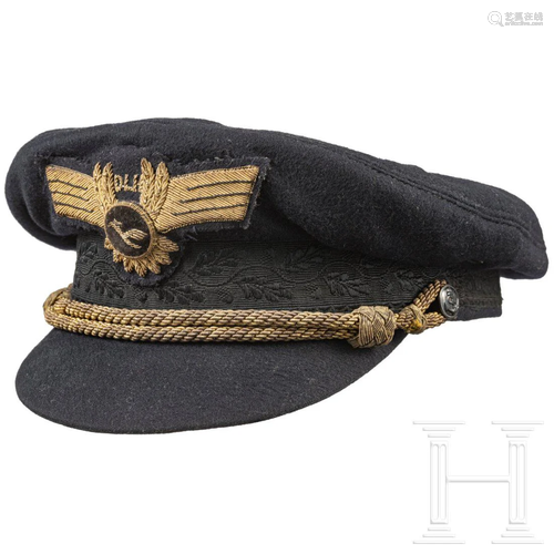 A visor hat for the service uniform of the German