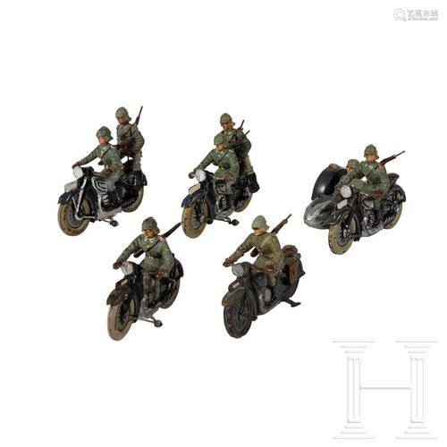 A group of five Lineol Motorcycles single and with