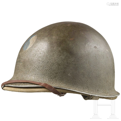 A Combat Steel Helmet M1 with Decal of the 29th 