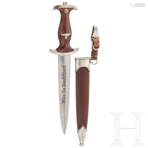 A model 33 SA service dagger with gift dedication from