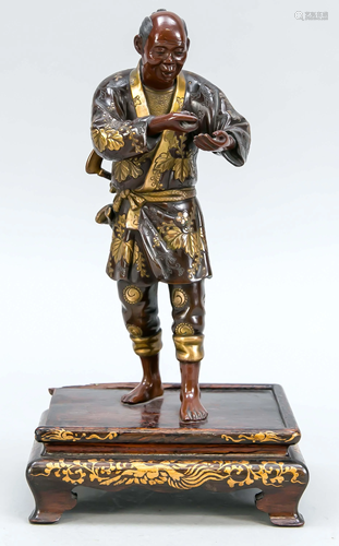 Bronze figure of a standing ma