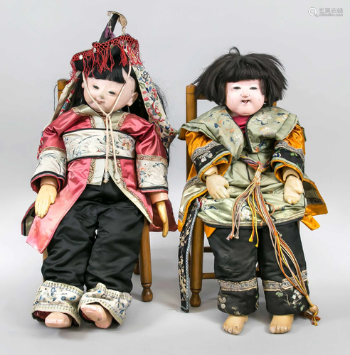 Pair of life-size child dolls,