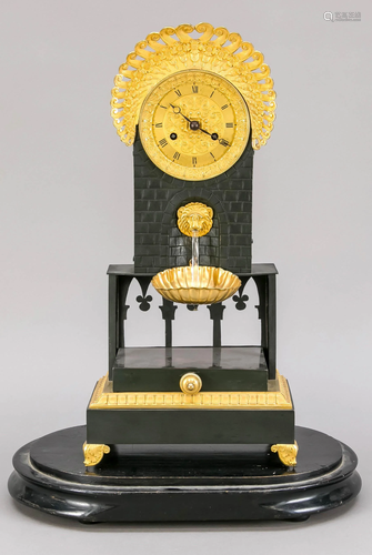 Table clock under glass dome,