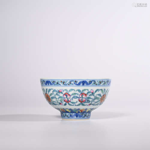 Qing Dynasty Yongzheng doucai peach shaped cup