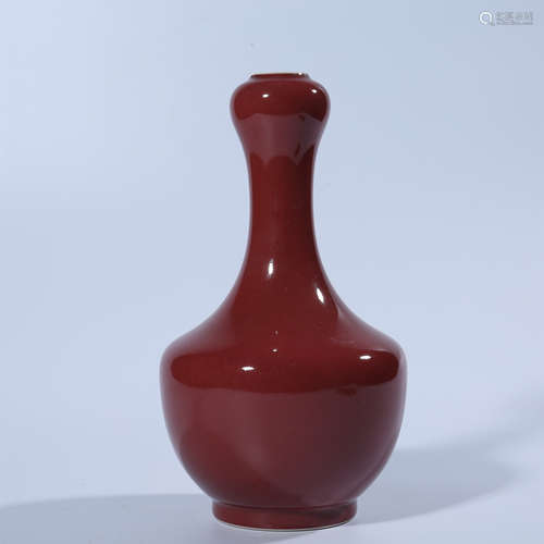 Qing Dynasty Qianlong red glaze garlic bottle