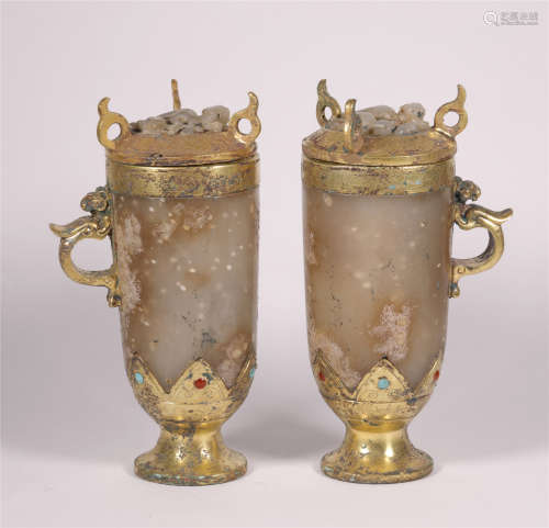 A PAIR OF JADE CUPS WITH GILT BRONZE
