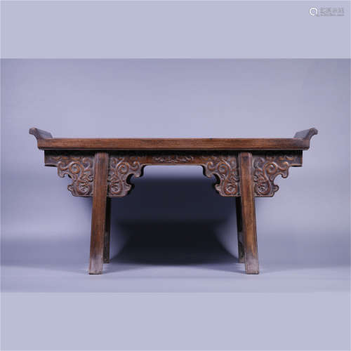 A HUANGHUALI WOODEN SHORT-LEGGED TABLE