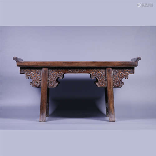 A HUANGHUALI WOODEN SHORT-LEGGED TABLE