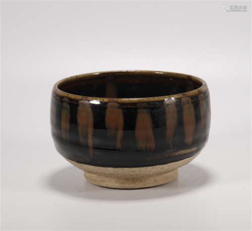 AN ACCIDENAL COLORING GLAZED DING YAO TEA CUP