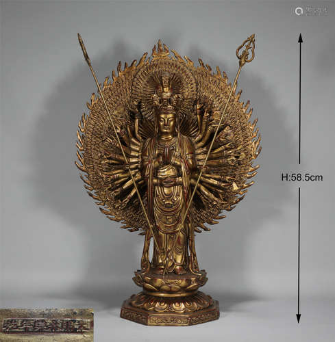 A GILT BRONZE GUAN YIN STATUE