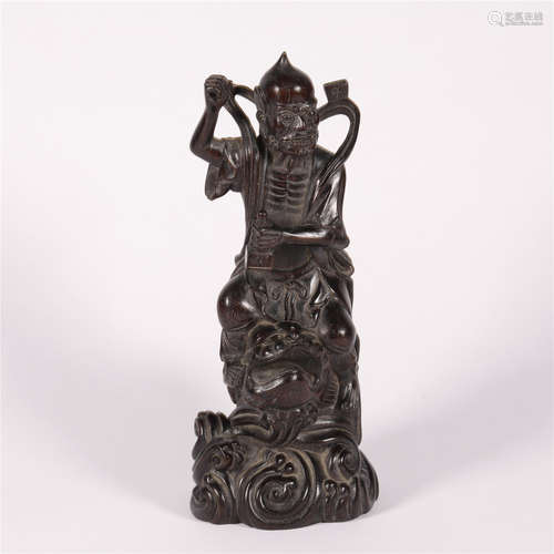 A QING STYLE STATUE OF MYTHICAL FIGURE MADE OF ZITAN WOOD. <...