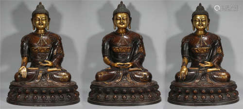A GROUP OF THREE SEATED BUDDHA