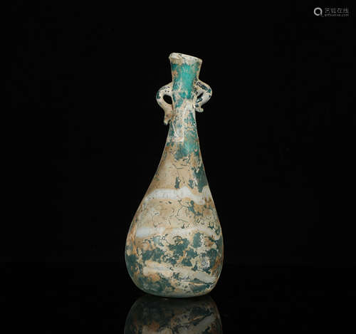 AN ANCIENT  GREEN GLASS VASE BOTTLE