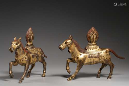 pair of chinese tibetan gilt bronze horses