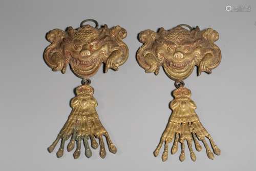 pair of chinese tibetan gilt bronze ornaments