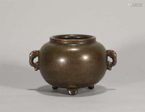 Yongzheng bronze glaze double-ear incense burner in Qing Dyn...