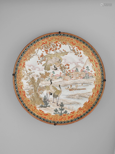 A LARGE ENAMELED KUTANI PORCELAIN CHARGER