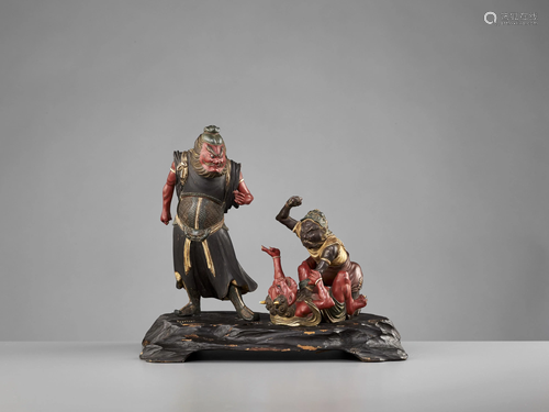 A RARE POLYCHROME WOOD GROUP WITH SHOKI AND ONI