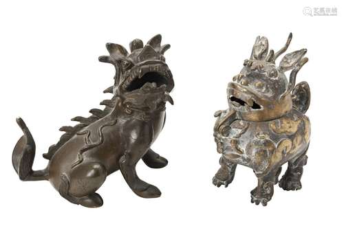 BRONZE LION  QING DYNASTY seated on its haunches, 14cm high;...