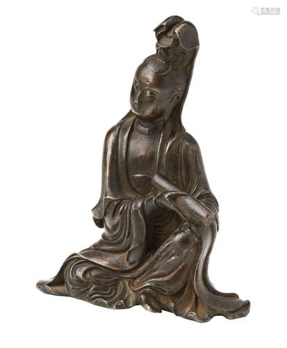 BRONZE SCROLL WEIGHT QING DYNASTY modelled as a seated figur...