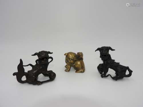 PAIR OF BUDDHIST BRONZE LIONS 17TH / 18TH CENTURY together w...