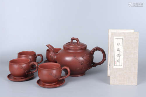 A Set of Dark-red Enameled Pottery