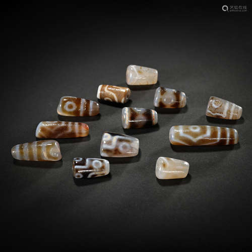 A SET OF DZI BEADS, TANG DYNASTY, CHINA