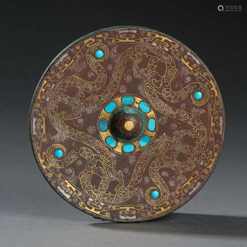 A BRONZE MIRROR INLAID WITH GOLD AND SILVER INLAID WITH TURQ...