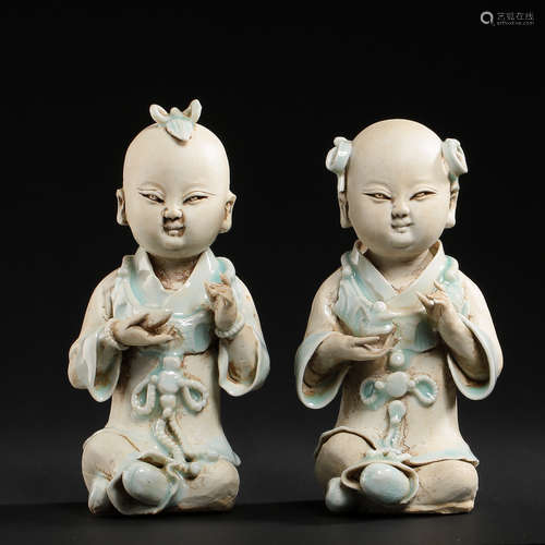 A PAIR OF HUTIAN WARE SEATED BOYS, NORTHERN SONG DYNASTY, CH...