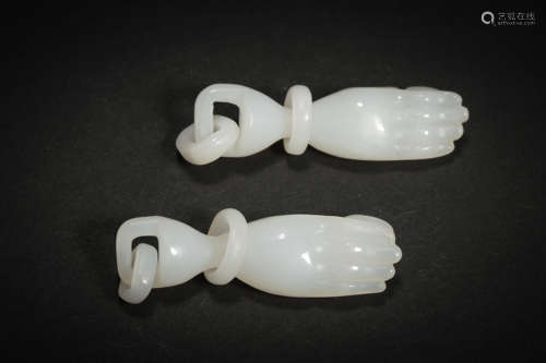 A PAIR OF HETIAN JADE BUDDHA HANDS , QING DYNASTY, CHINA