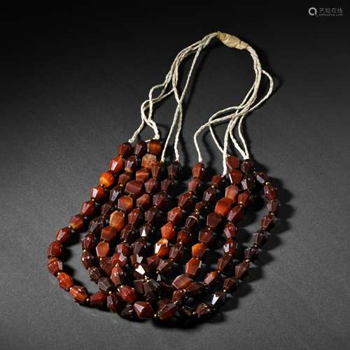 A SET OF PERSIAN CULTURE AGATE STRING