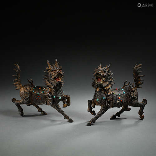 A PAIR OF COPPER UNICORNS INLAID WITH TURQUOISES, QING DYNAS...