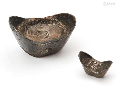 TWO CHINESE SILVER INGOTS of boats shape form, with impresse...