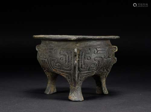 Three-legged Bronze Stove with Animal Patterns in Han Dynast...