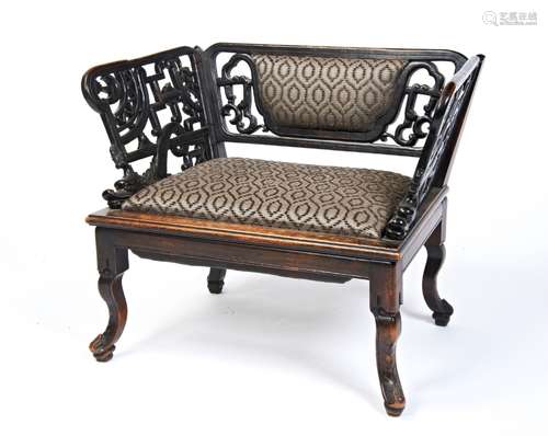 CARVED HARDWOOD AND UPHOLSTERED LOW ARMCHAIR LATE QING DYNAS...