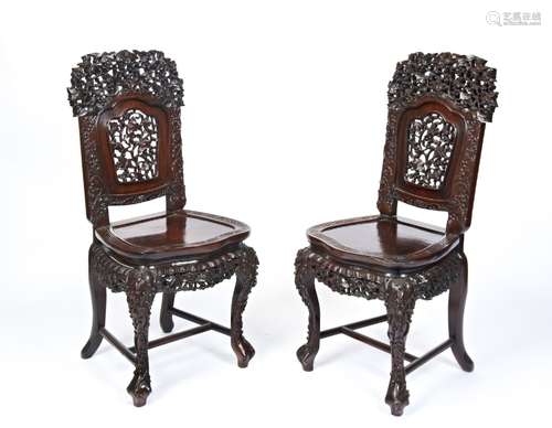 PAIR OF CARVED HUANGHUALI SIDE CHAIRS QING DYNASTY, 19TH CEN...