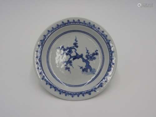 JAPANESE BLUE AND WHITE DISH  17TH CENTURY painted with a pl...